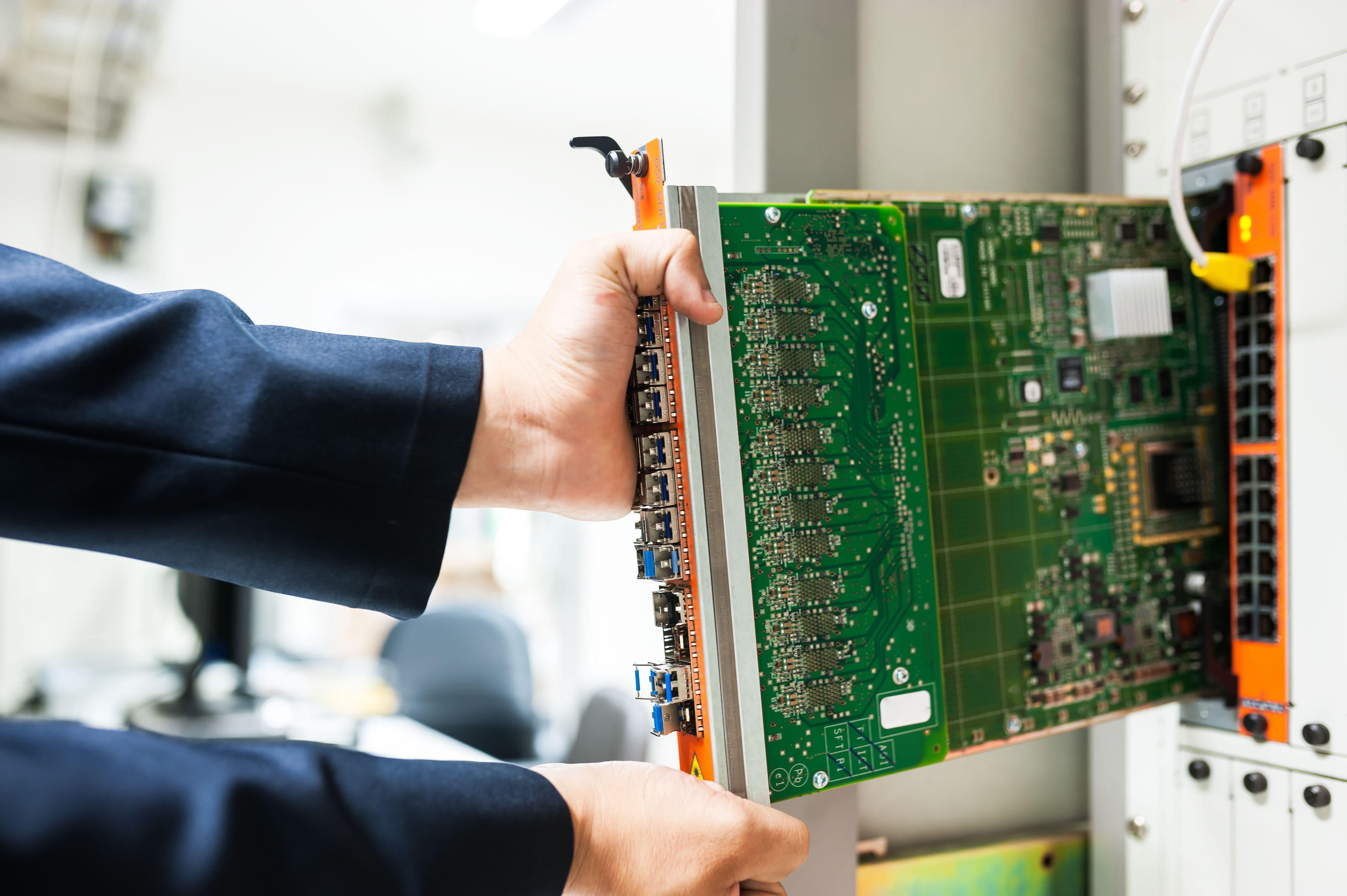 Technician servicing critical support equipment